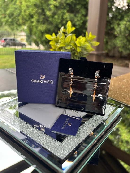 Swarovski Jewelry - Swarovski Symbolic Pierced Earring Jackets feature celestial star and moon NWT